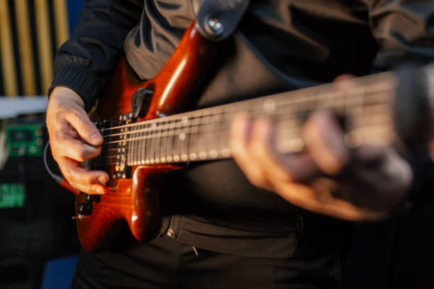 istock Electric guitarist playing on live performance 2206000497
