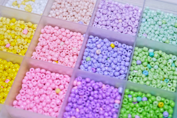 istock Colorful Bead Arrangement in Storage Box Close-Up 2206001087