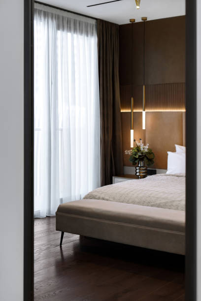 istock Modern bedroom interior with elegant decor and cozy lighting 2206015495
