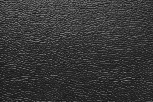 istock Glossy structure of genuine leather, natural black colored skin surface, leatharette texture 2206015552