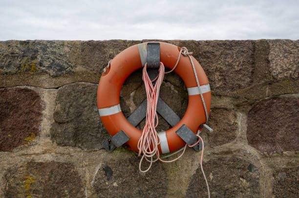 istock A lifebuoy on a harbor wall 2206020179