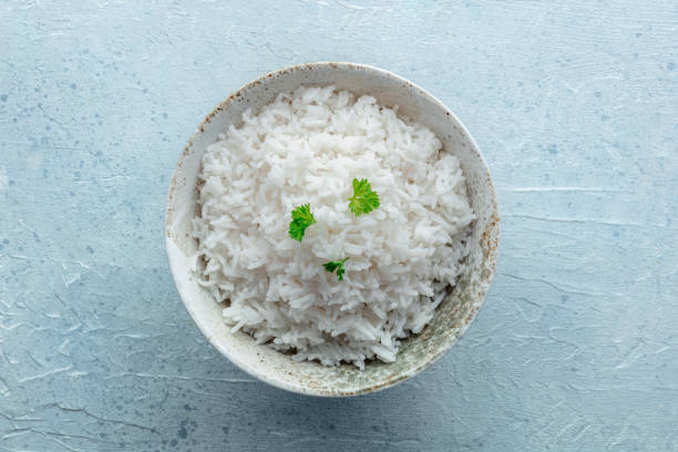 istock White rice, cooked. A bowl of boiled long grain rice, a simple side dish 2206020391