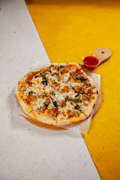 istock Mexican flavoured wood fired oven baked pizza 2206024043