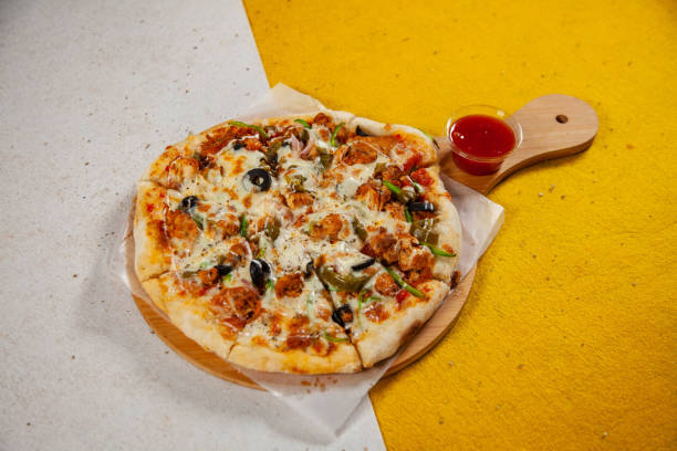 istock Mexican flavoured wood fired oven baked pizza 2206024049