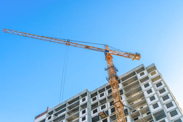 istock Construction of modern apartments. Construction site with cranes background 2206026061