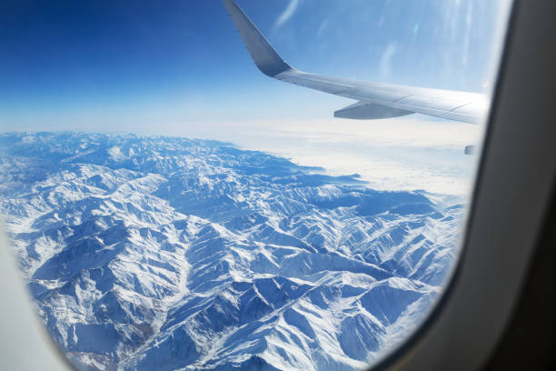 view of the mountain range from the airplane window