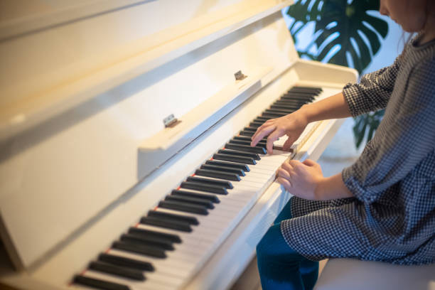 Little girl playing piano