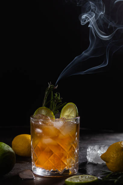 istock Cocktail with lime and rosemary close-up 2206030280