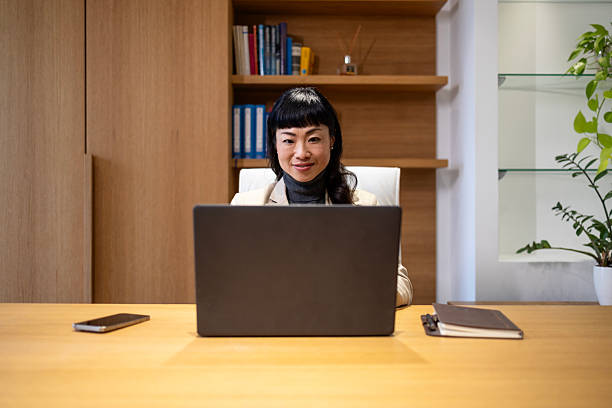 istock Hardworking female Japanese manager in the office. 2206032804