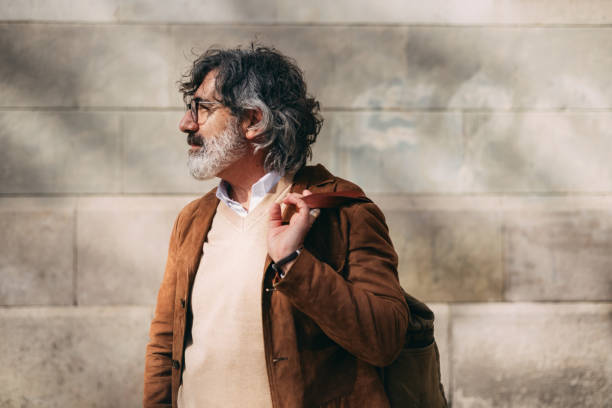 istock Casual Mature Man Outdoors in Stylish Attire on a Bright Day 2206033778