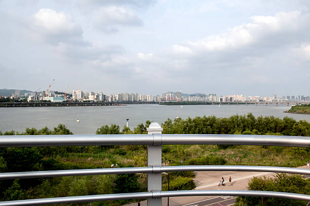 istock bridge fence at the riverside 2206039922