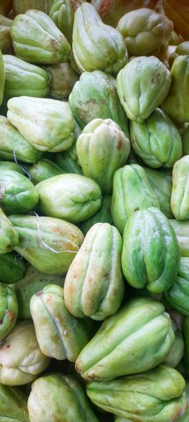 istock A bunch of chayote or sicyos edulis (Latin). 2206042267
