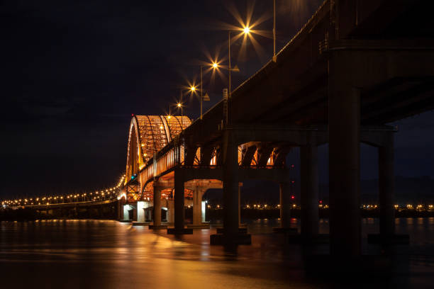 istock illuminated bridge on Han River in Seoul 2206042295