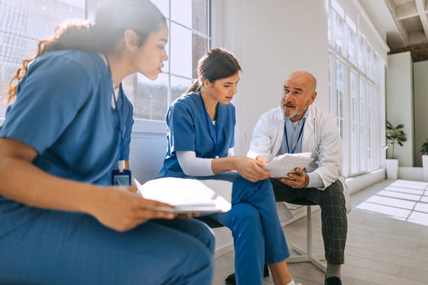 istock Discussing ways to better their hospital 2206047056