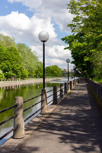 Rideau Canal in Ottawa, Canada. Sidewalk along the waterfront in spring