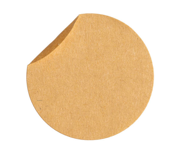 istock textured crumpled sticker paper Round price tag sticker with copy space, featuring a cutout transparent background for easy integration into office designs 2206049564