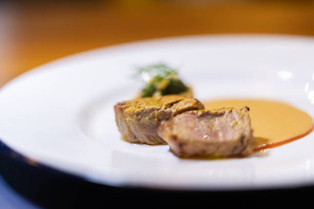 Close up grilled sliced beef steak with albufera sauce