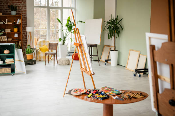 istock Art Studio Interior with Easels and Supplies 2206057497