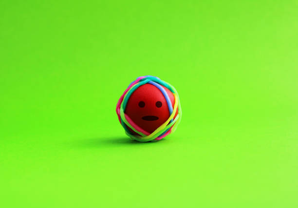 istock Facial expression on a sphere tied with rubber bands 2206059264
