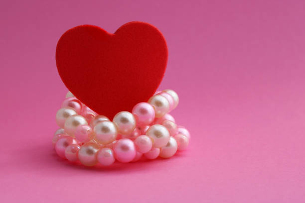 Love for pearls, heart and necklace