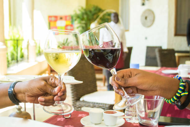 istock Elegant Wine Toast in a Vibrant Outdoor Setting 2206060624