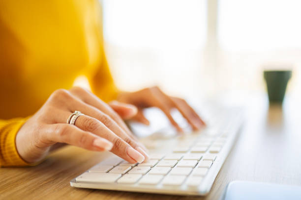 istock Unrecognisable person typing on keyboard 2206061089