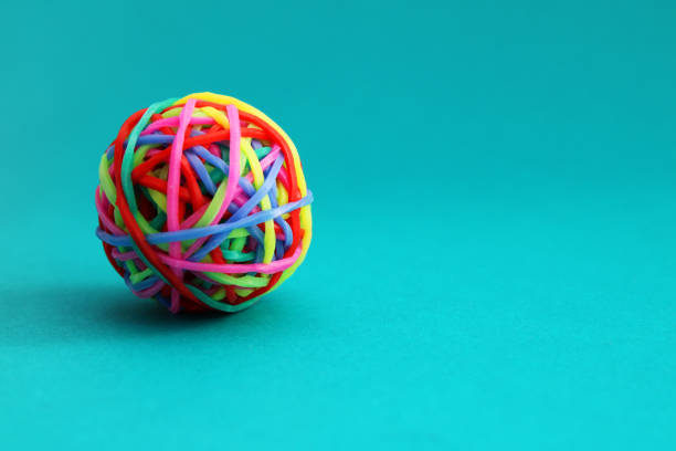 istock Conflict ball, sphere formed with colorful rubber bands 2206065638