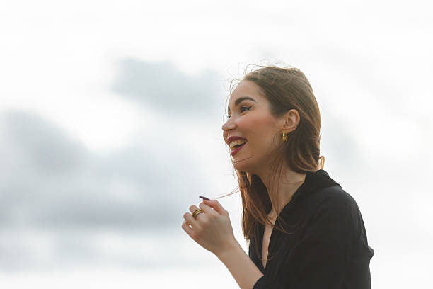 Photo of lovely cheerful girl wear stylish clothes enjoying walk summer shiny nice weather outdoors.