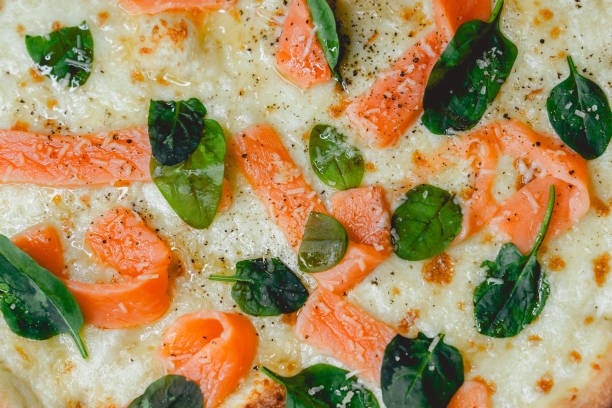 istock Pizza with salmon and spinach in box 2206070140