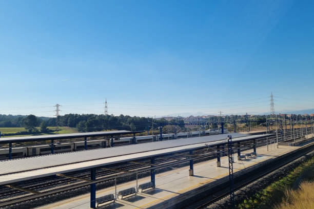 istock Empty Train Station Platform under Clear Blue Sky for Transportation and Travel 2206071127