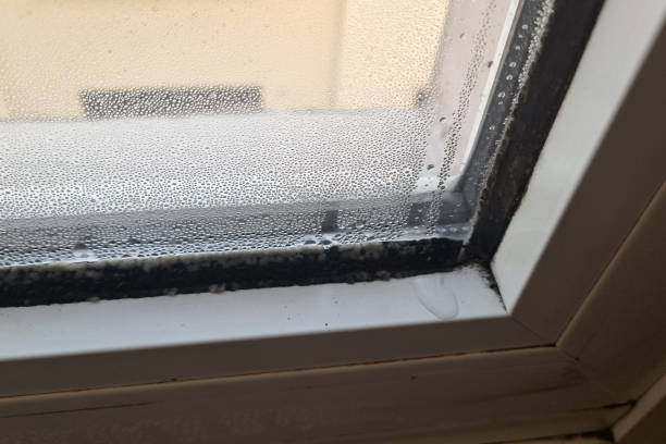 istock Moisture Condensation on Window Glass in Cold Weather 2206071133