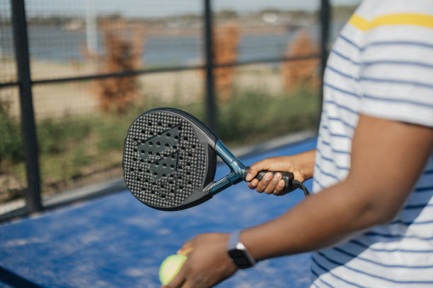 istock Close-up of paddle and ball in play 2206074625
