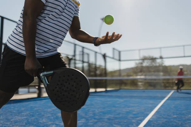istock Close-up of ball poised before powerful serve 2206074858