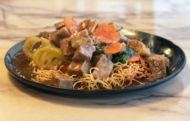 istock Beef Brisket with Pan Fried Noodles Table 2206075011