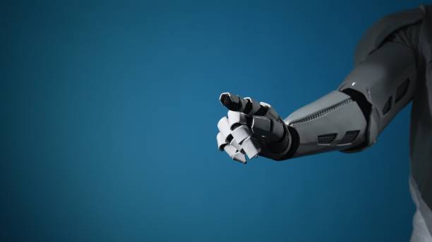 istock Futuristic robotic hand reaching out against blue background 2206075596
