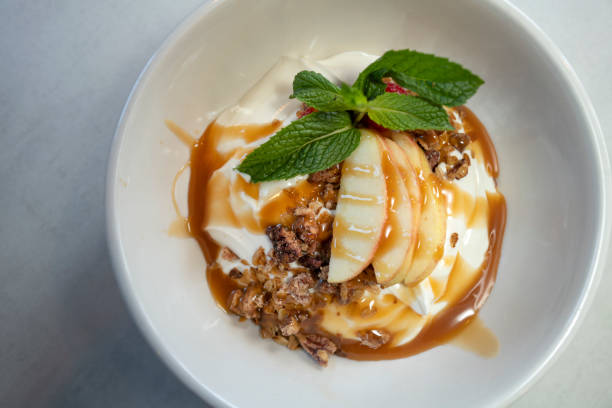 istock Apple Pecan Granola Bowl Peek 2206076102