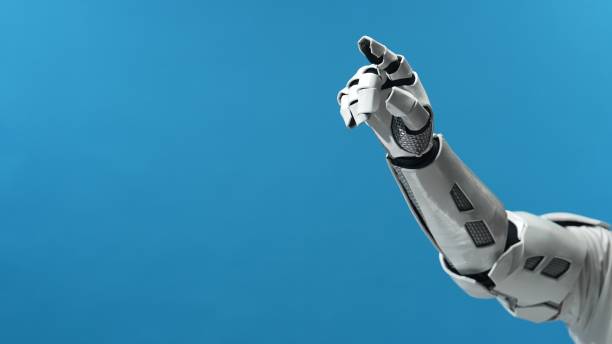 istock Robotic Arm Reaching Gesture on Blue Background for Digital Concepts 2206077476