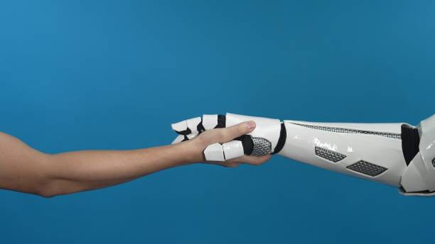 istock Human and Robotic Hand Reaching Towards Each Other in Unity 2206077914