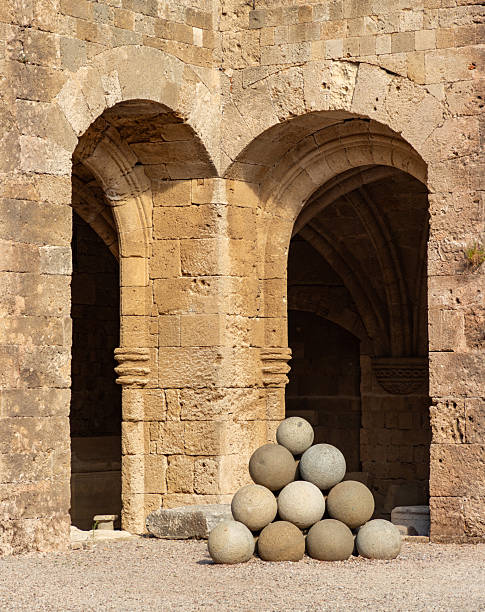 Rhodes City, Rhodes, Greece - October 19, 2024: A picture of cannon balls at the Archaeological Museum of Rhodes.