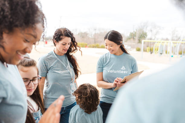 istock Volunteers working together at a community event 2206081024