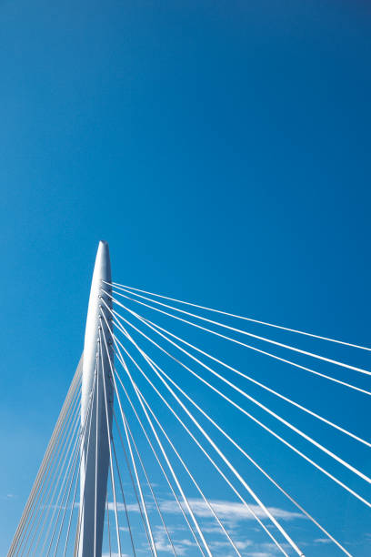 istock Dutch motorway bridge on a blue sky day 2206089325