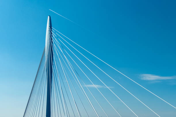 istock Dutch motorway bridge on a blue sky day 2206089415