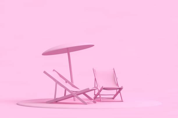 Summer concept with sunbeds and umbrellas