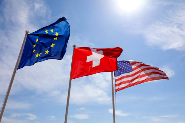 istock The flags wave in the wind against a blue sky 2206096070