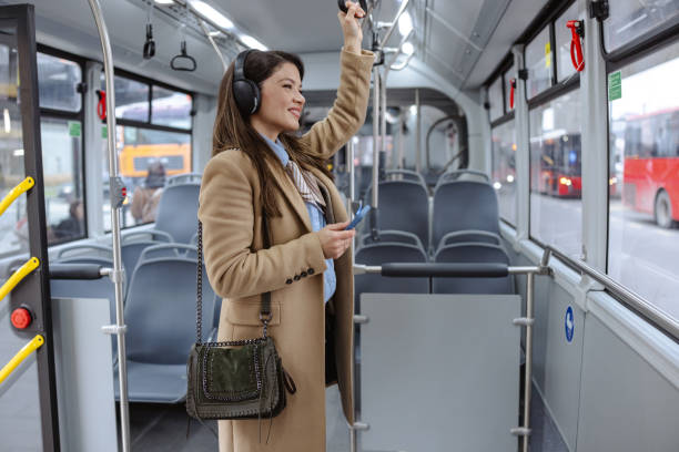 istock Businesswoman riding in bus 2206107774