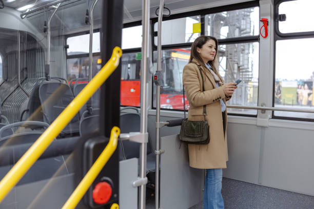 istock Woman commuting by bus after work 2206107958