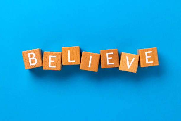 istock Block Words with Faith on a Blue Background 2206110921