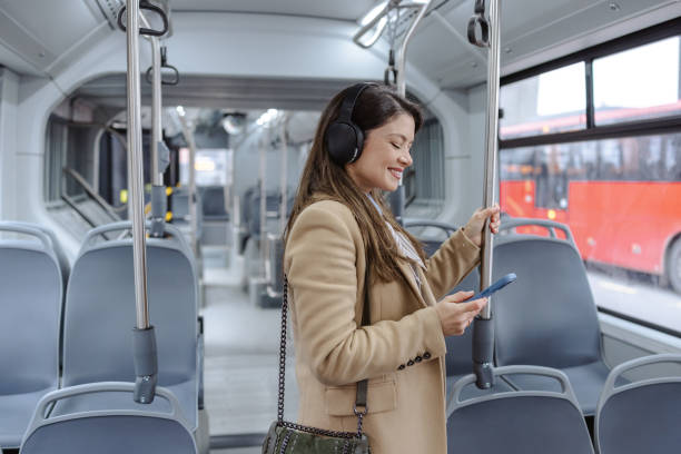 istock Woman consuming internet content in bus 2206112698