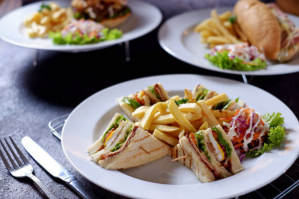 Zinger Prawns Sandwich with Coleslaw and French Fries, Served with Sauce