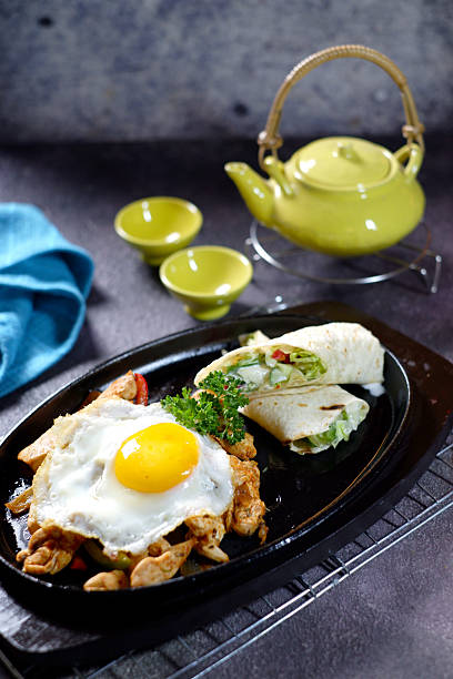 istock lose-up of breakfast consisting of fried egg 2206115685
